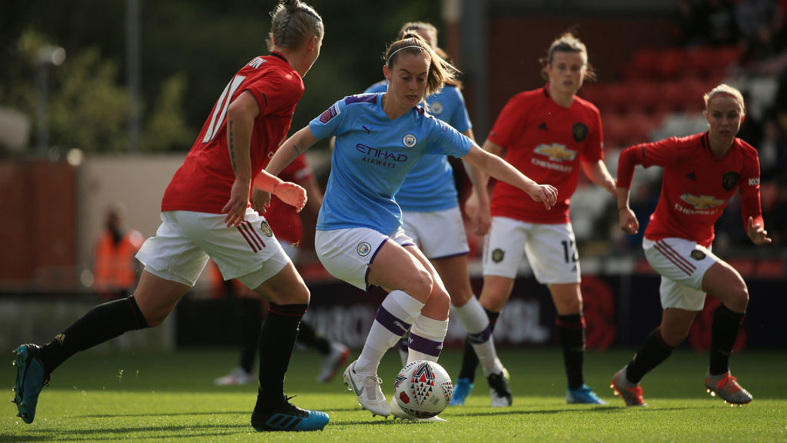 BLUE v RED: City fan Keira Walsh in action against United