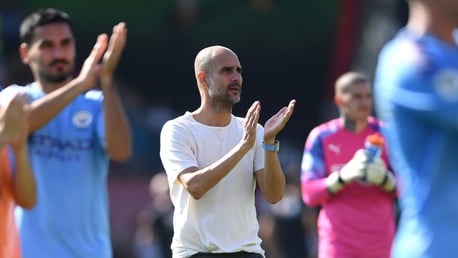 APPLAUSE: Pep Guardiola salutes the travelling City fans.