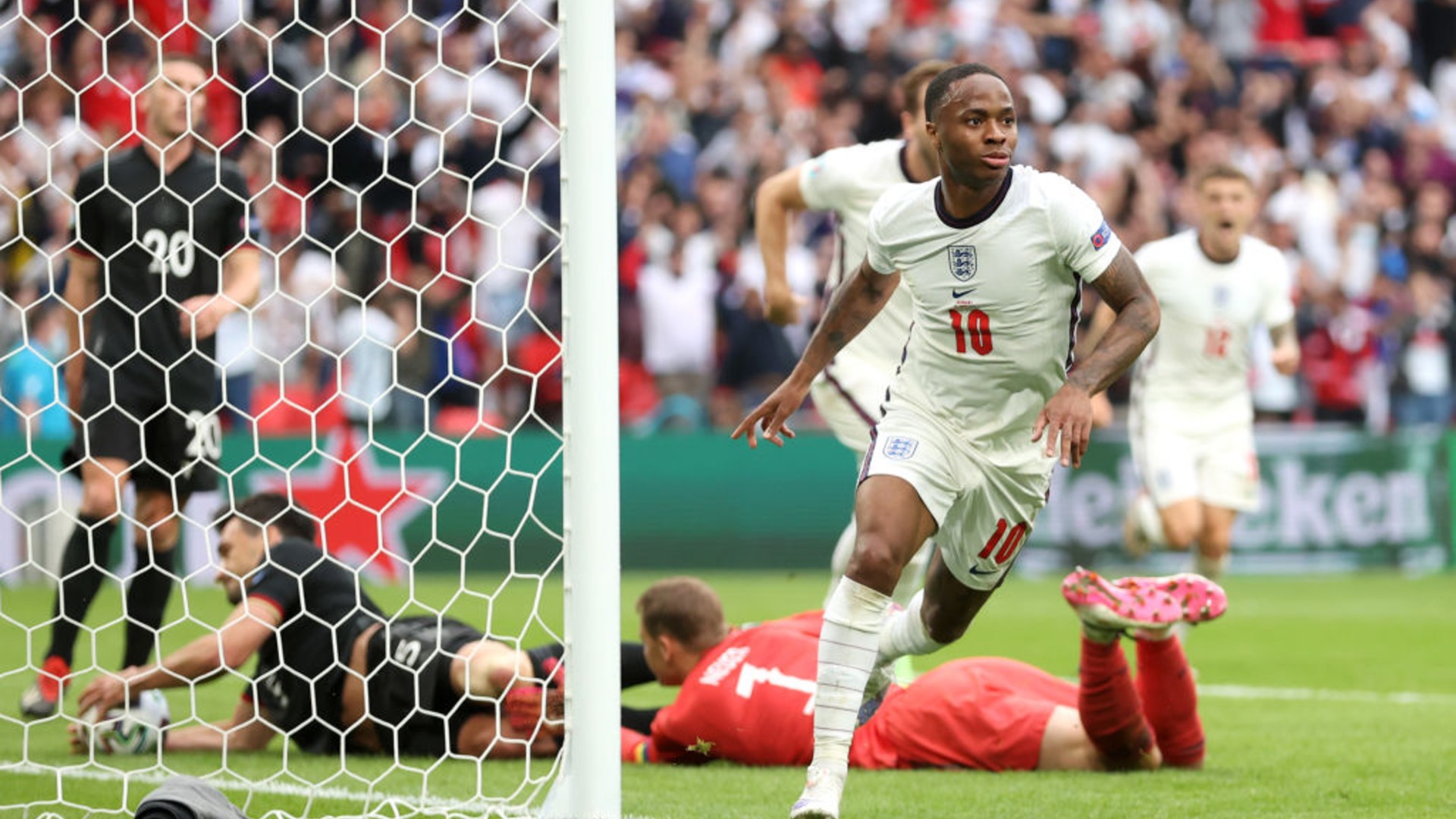 LETHAL WEAPON: Raheem Sterling celebrates after his last-16 strike against Germany