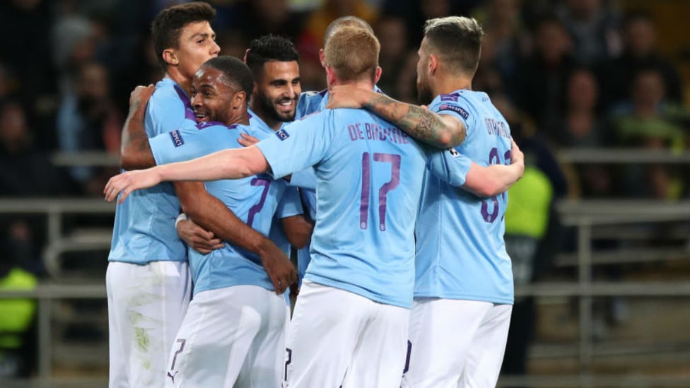 CENTRE OF ATTENTION : Riyad Mahrez is mobbed by his team-mates after his first half goal