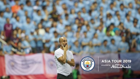 THE GAFFER: Pep Guardiola watches on