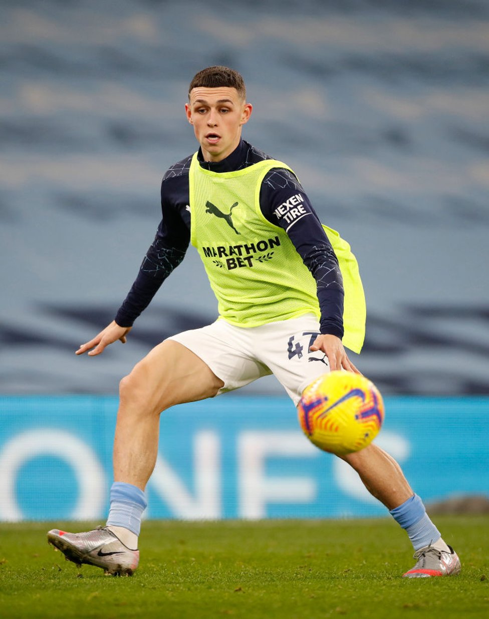 PHIL-ING IT : Foden gets into the groove as the pre-match warm up intensifies.