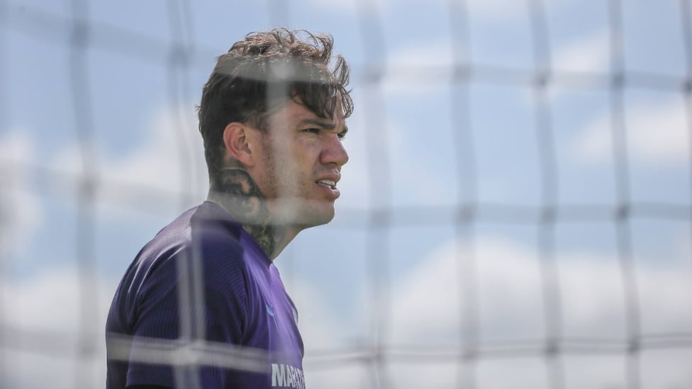 NET MINDER : Ederson watches on.