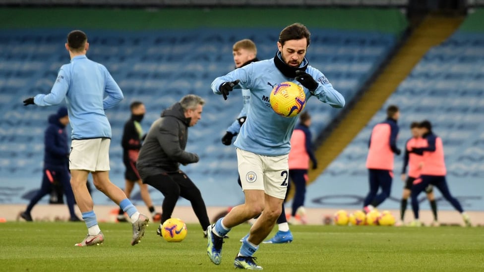 WRAPPED UP : Snood and gloves needed for Bernardo on an icy evening at the Etihad.