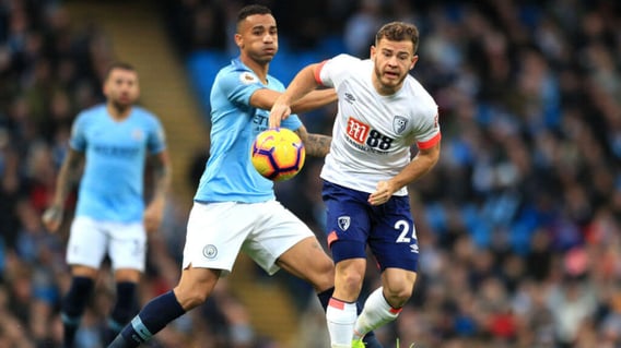 MY BALL: Danilo and Ryan Fraser battle for possession 