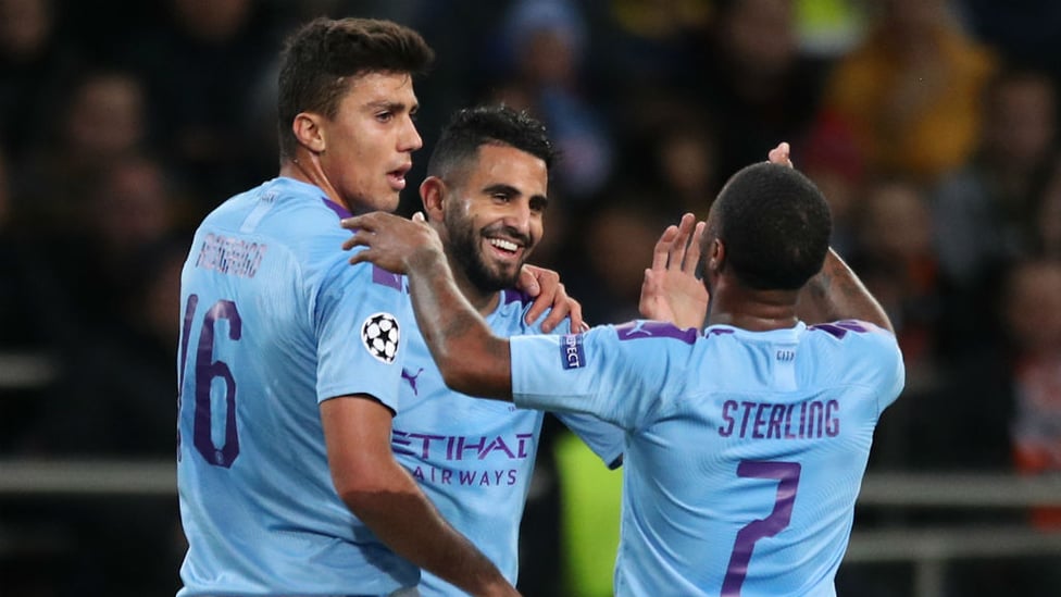 ALL SMILES : Riyad Mahrez celebrates after City's opener