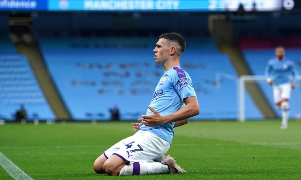 Phil the power : Foden scores in the 4-0 win over Liverpool after the season restart