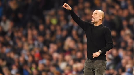INSTRUCTING: Pep Guardiola makes his point from the touch line.