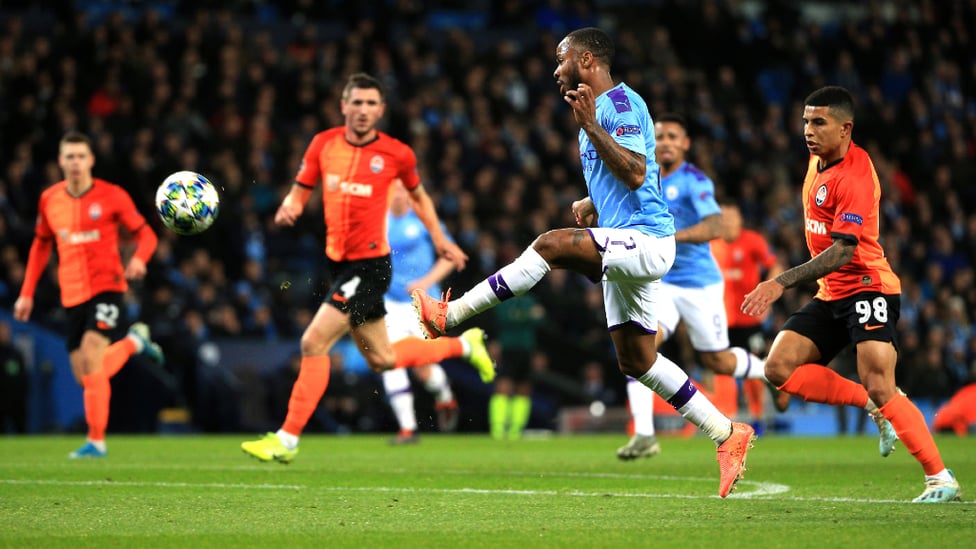 STERLING EFFORT : Raheem Sterling looks to clip the ball over Andriy Pyatov