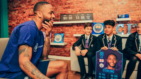 STERLING WORK: Raheem with some of the students from Ark Elvin Academy