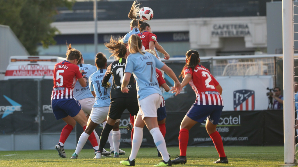 ON YER HEAD: Gemma Bonner rises highest to head home the opener