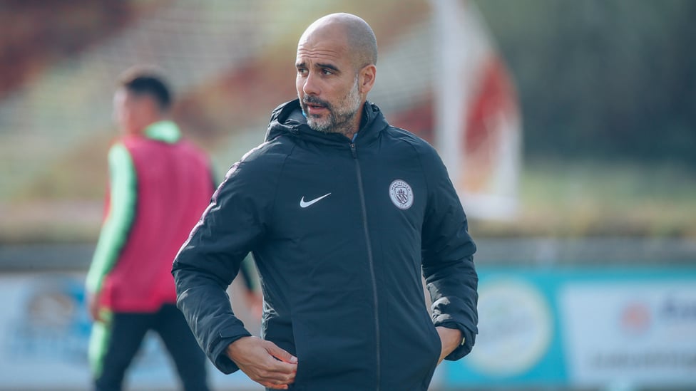 PLEASED AS PEP : The manager watches on
