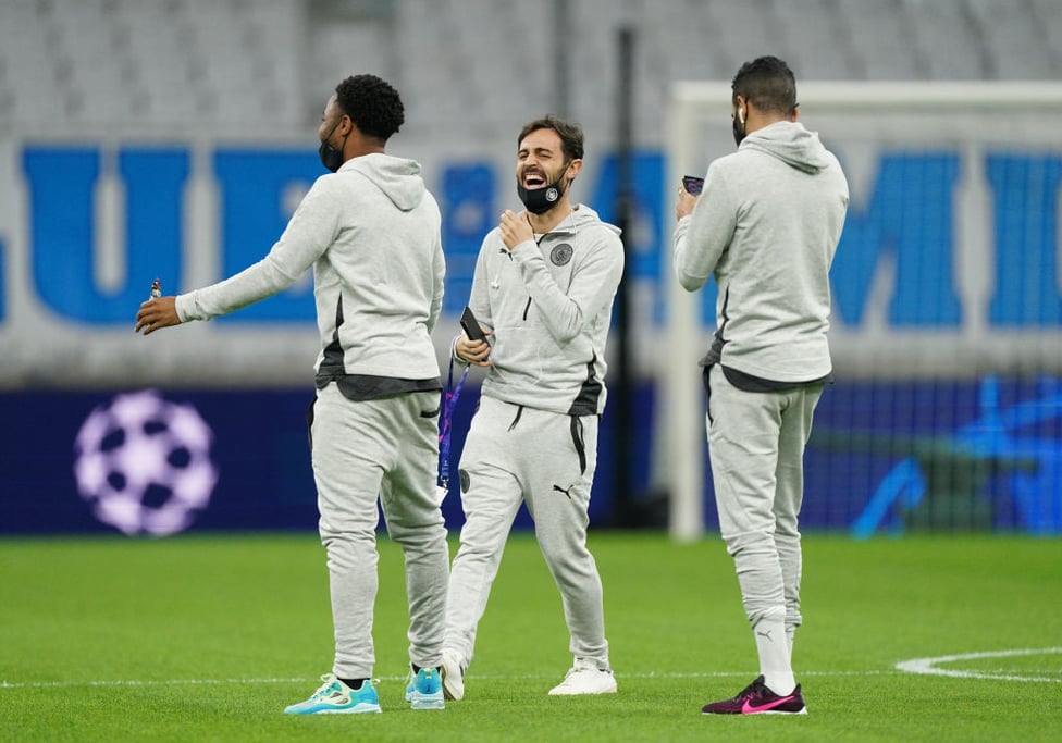 ALL SMILES : The lads familiarise themselves with the pitch