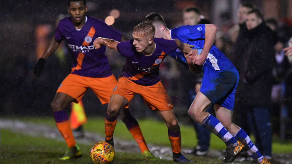 ACTION STATIONS: Lewis Fiorini looks to put City on the front foot against Clevedon Town