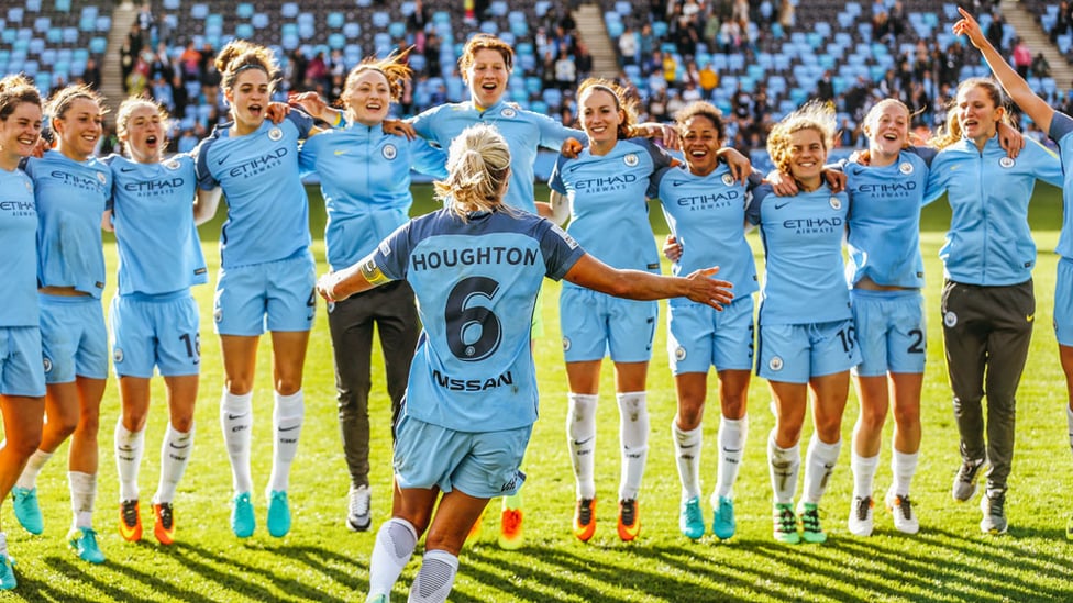 CHAMPIONS : Steph Houghton turns to her team-mates as celebrations of our first FA WSL title get under way in 2016.