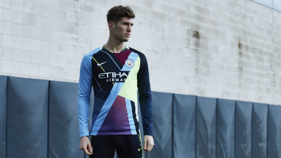 ACTION STATIONS : John Stones looks the business in the new mashup jersey