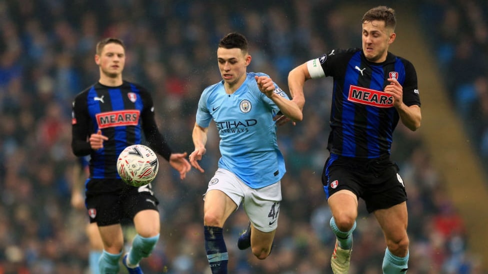 TEEN SPIRIT : Phil Foden takes the fight to the Rotherham back-line