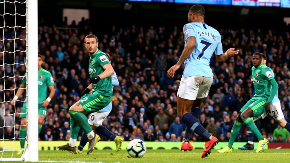 TWO'S COMPANY : Raheem slots home his and City's second goal after great work by David Silva and Riyad Mahrez