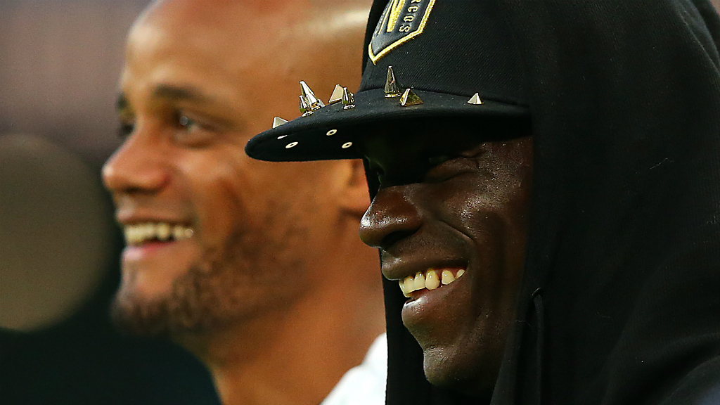 ALL SMILES : Mario Balotelli shares a few laughs with his old captain