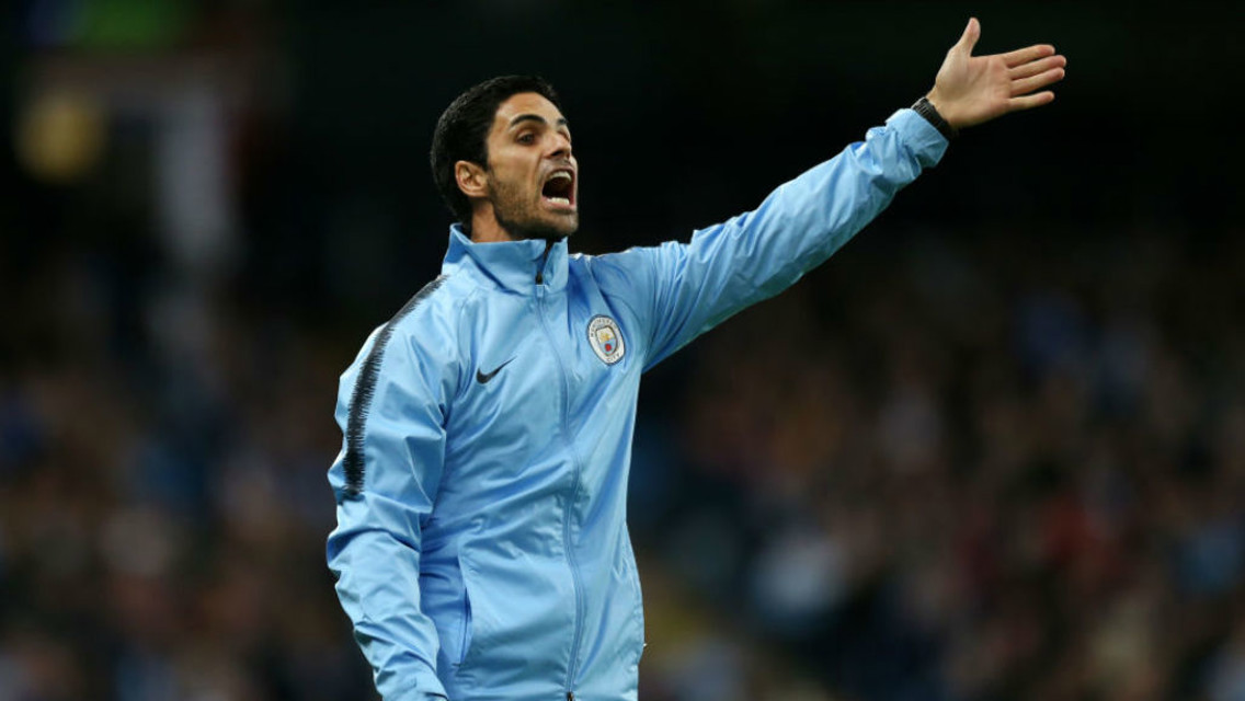 SHOUTING THE ODDS: Mikel Arteta passes on instructions to the City players