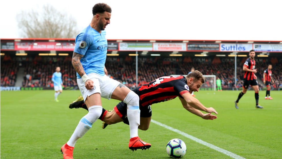 FALL GUY : Kyle Walker shows his strength to fend off Ryan Fraser who goes tumbling