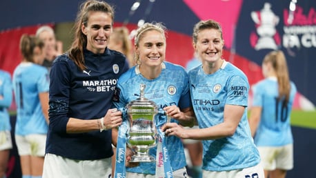 THREE CHEERS: Jill celebrates winning the FA Women's Cup for the third time after this month's win over Everton alongside City and England colleagues Steph Houghton and Ellen White