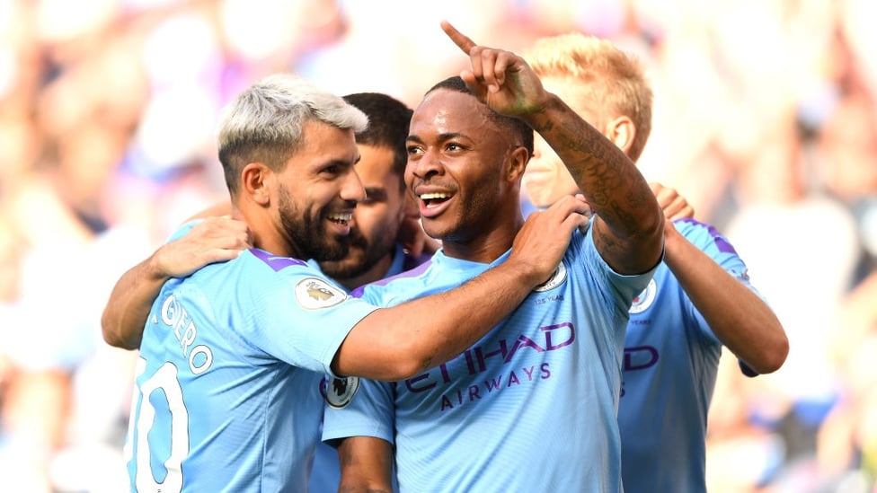 DELIGHT : City's players celebrate Raheem Sterling's opener.