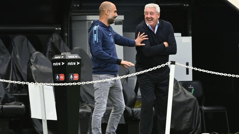 BEST OF ENEMIES: All smiles in the dugout ahead of kick off