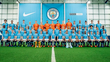 HISTORY MAKERS: Pep Guardiola and Nick Cushing line up alongside their two squads with the Continental and Carabao Cups proudly on display