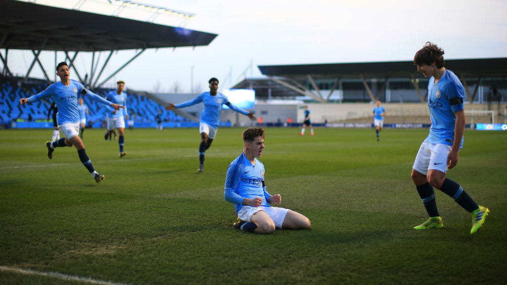 SLIDE RULE : Ben Knight celebrates after netting City's opener