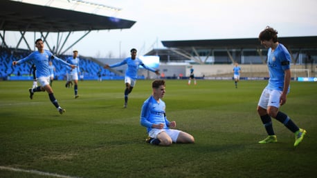 SLIDE RULE: Ben Knight celebrates after netting City's opener 