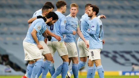 CAPTAIN FANTASTIC: The players gather to celebrate the De Bruyne's goal.