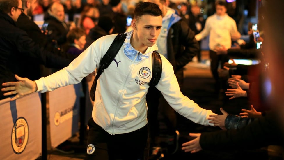 BABY SHARK : Foden greets the fans as he arrives at the Etihad.