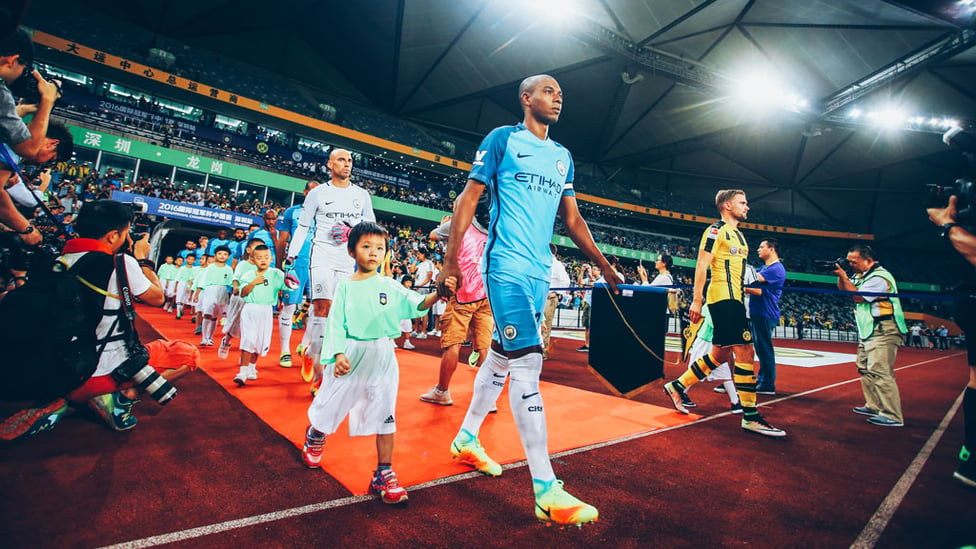 LEADING MAN : Fernandinho leads City out during a pre season friendly against Borussia Dortmund in 2016