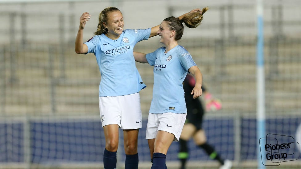 CELEBRATIONS : Lawley and Claire Emslie celebrate after taking the lead.