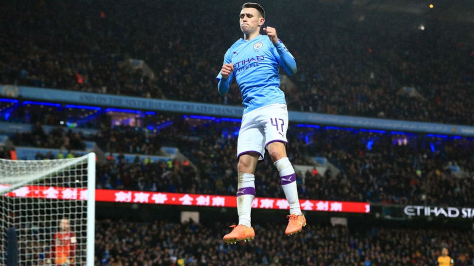 HIGH AND MIGHTY : Phil Foden celebrates what was a superb strike