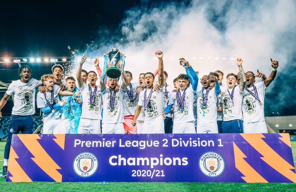 RECORD BREAKERS : The lads secure our very first PL2 title.