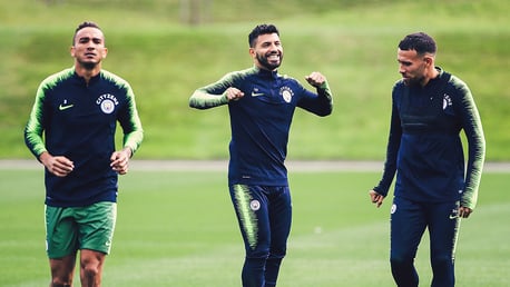 CENTRE OF ATTENTION: Sergio Aguero is all smiles alongside Danilo and Nicolas Otamendi