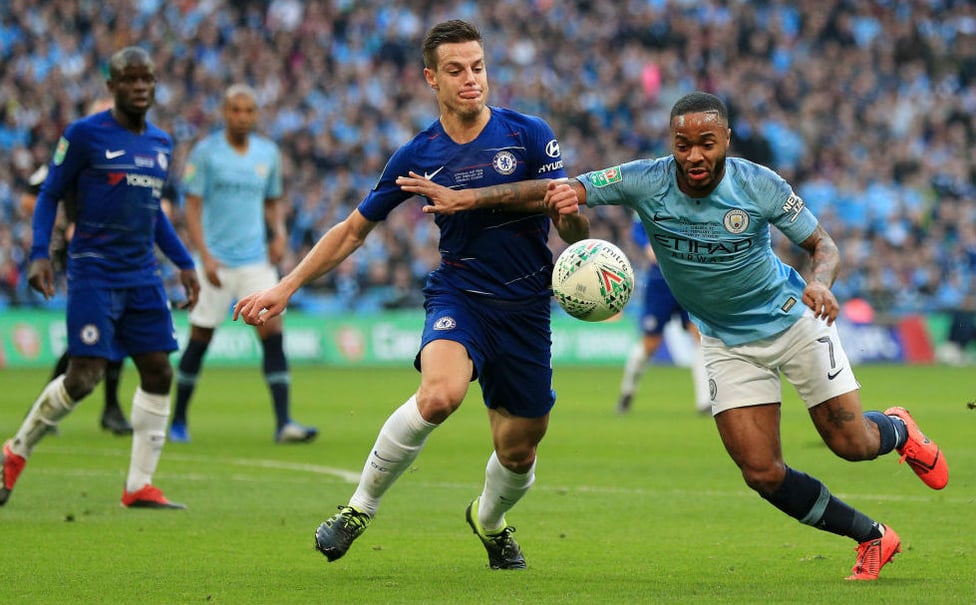 ACTION STATIONS : Raheem Sterling looks to fend off Cesar Azpilicueta