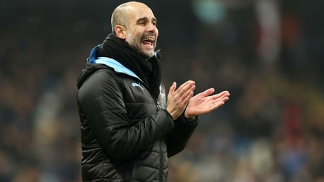 THE BOSS: Guardiola offers encouragement to his players at the Etihad.