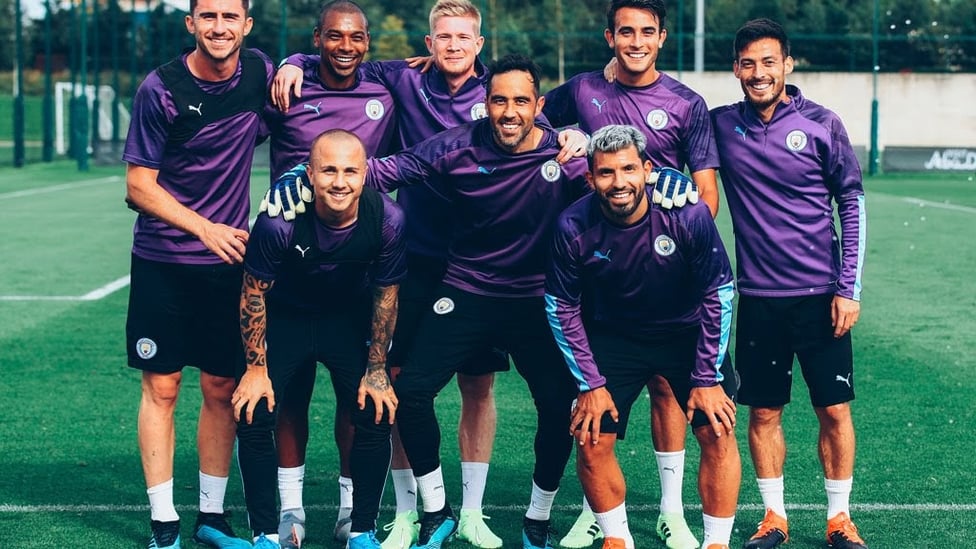 ALL TOGETHER NOW: David poses with some of his City team-mates during a pre-season session from last August