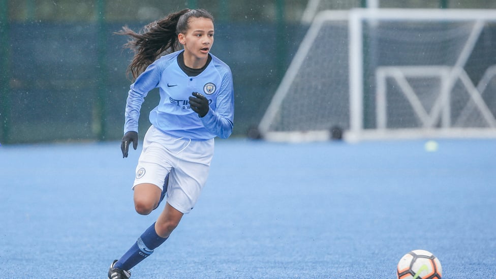 RAIN AND SHINE : Lois braves the Manchester weather