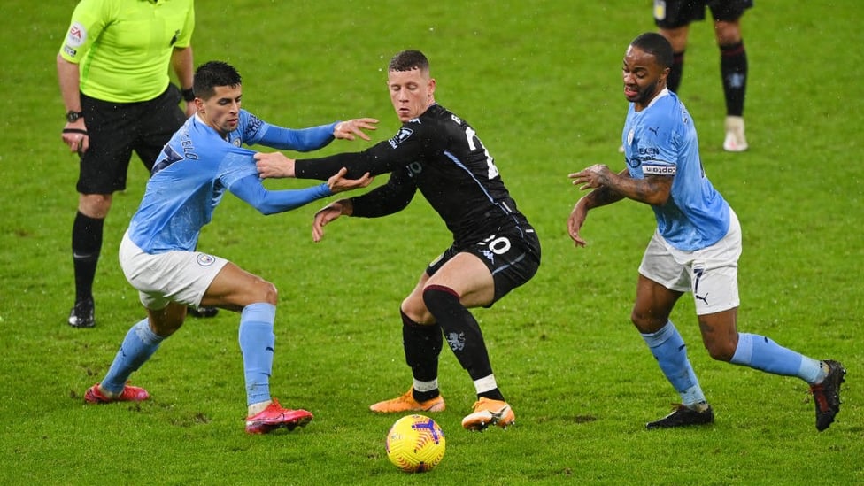 DOUBLING UP: Joao Cancelo and Raheem Sterling put the pressure on Ross Barkley