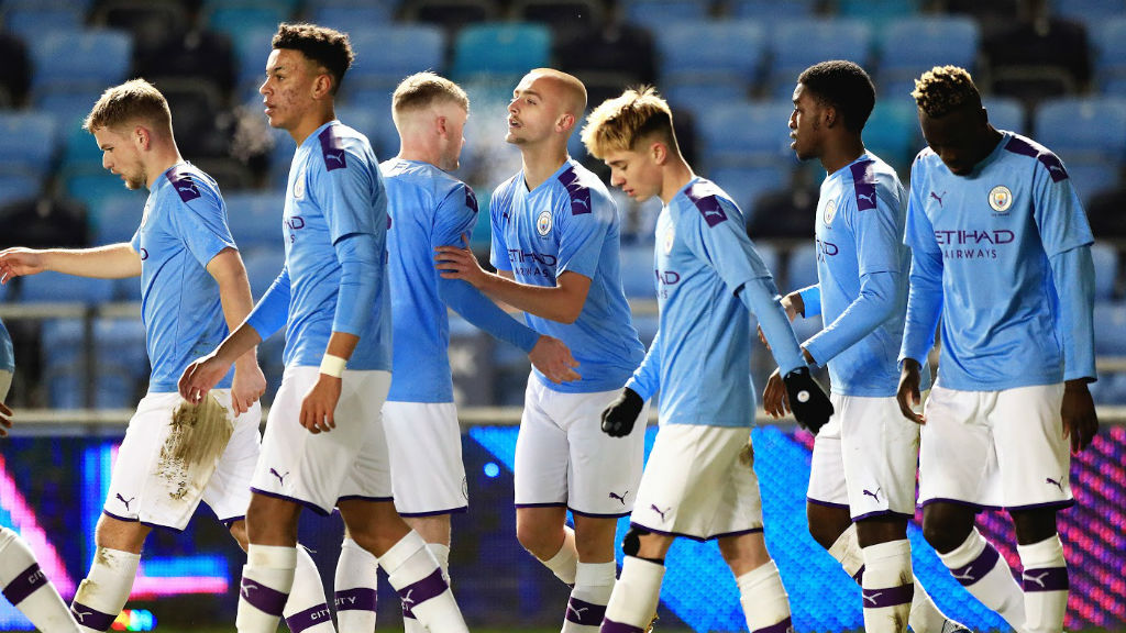 EARLY STRIKE: The City players celebrate after Lewis Fiorini's goal