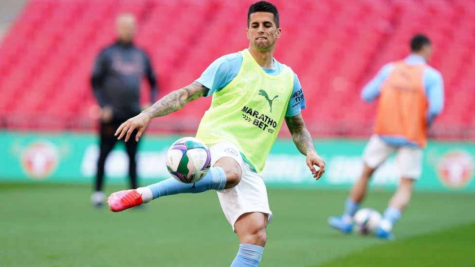 TECHNIQUE : Cancelo volleys the ball during the pre-match warm up.