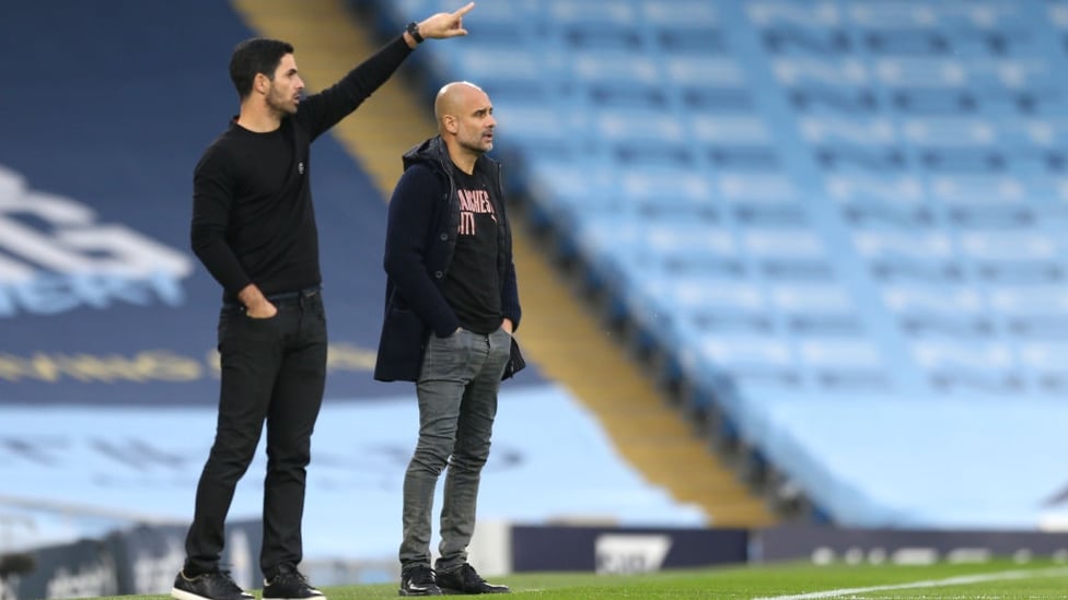 FAMILIAR SIGHT : Guardiola and Artera share the touchline once again at the Etihad.