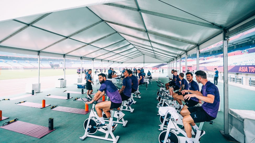 TOUR DE CITY : Loosening up on the exercise bike.