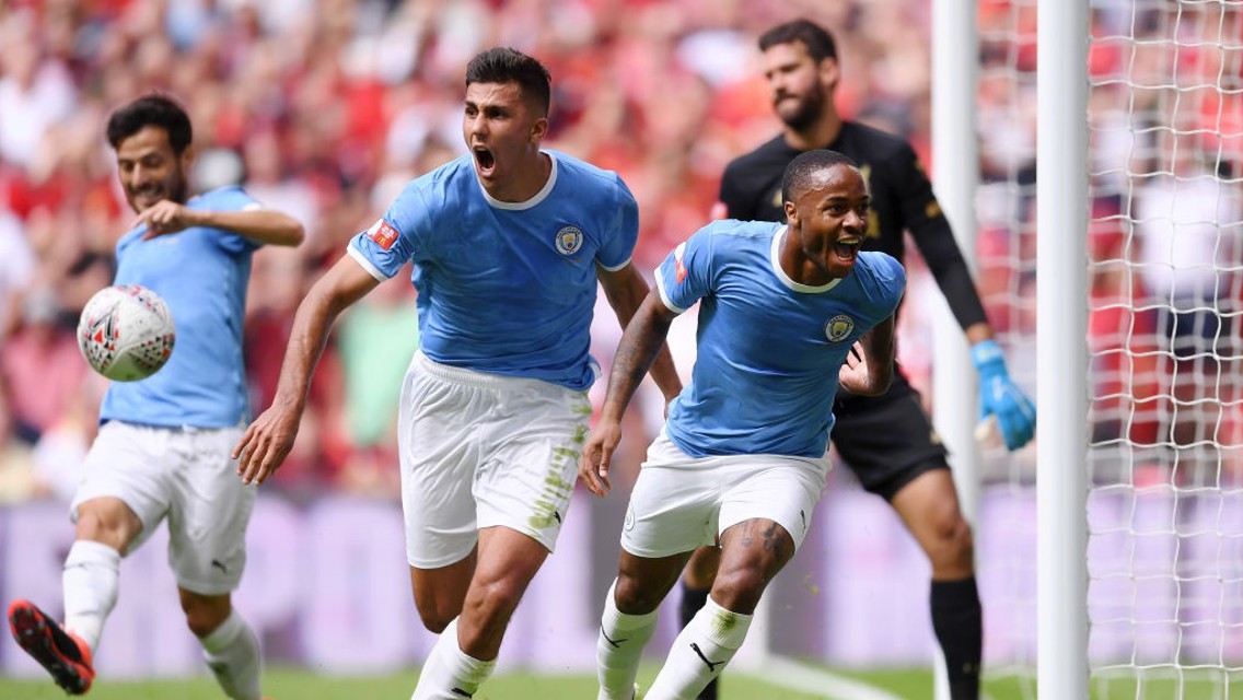 BREAKTHROUGH: Raheem Sterling celebrates scoring City's opener.
