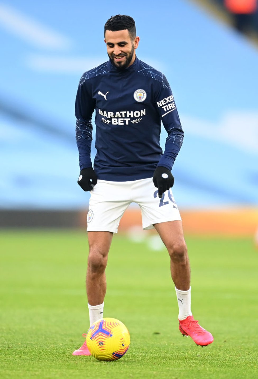 ALL SMILES : Mahrez looks in confident mood during the pre-match warm up, fresh after his treble against Burnley.