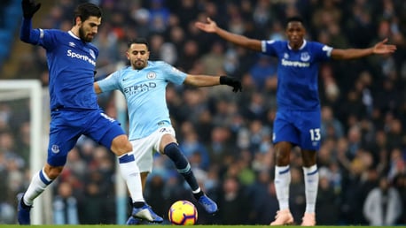 FULL STRETCH: Riyad Mahrez looks to dispossess Andre Gomes